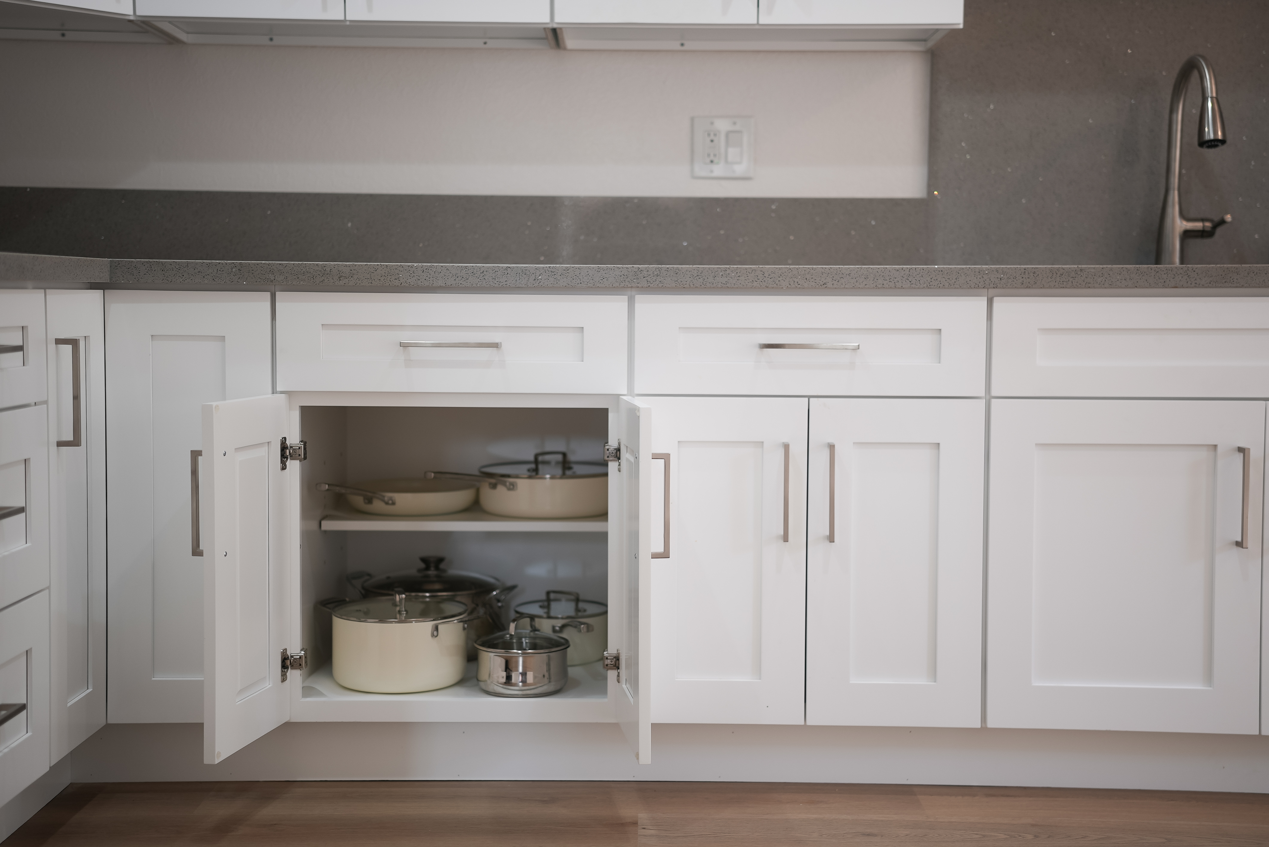 Huntington Beach kitchen detail view — custom cabinetry, hardware and premium finishes
