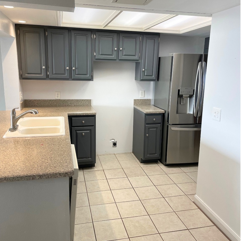Santa Monica kitchen before remodel — original dark cabinets and closed layout