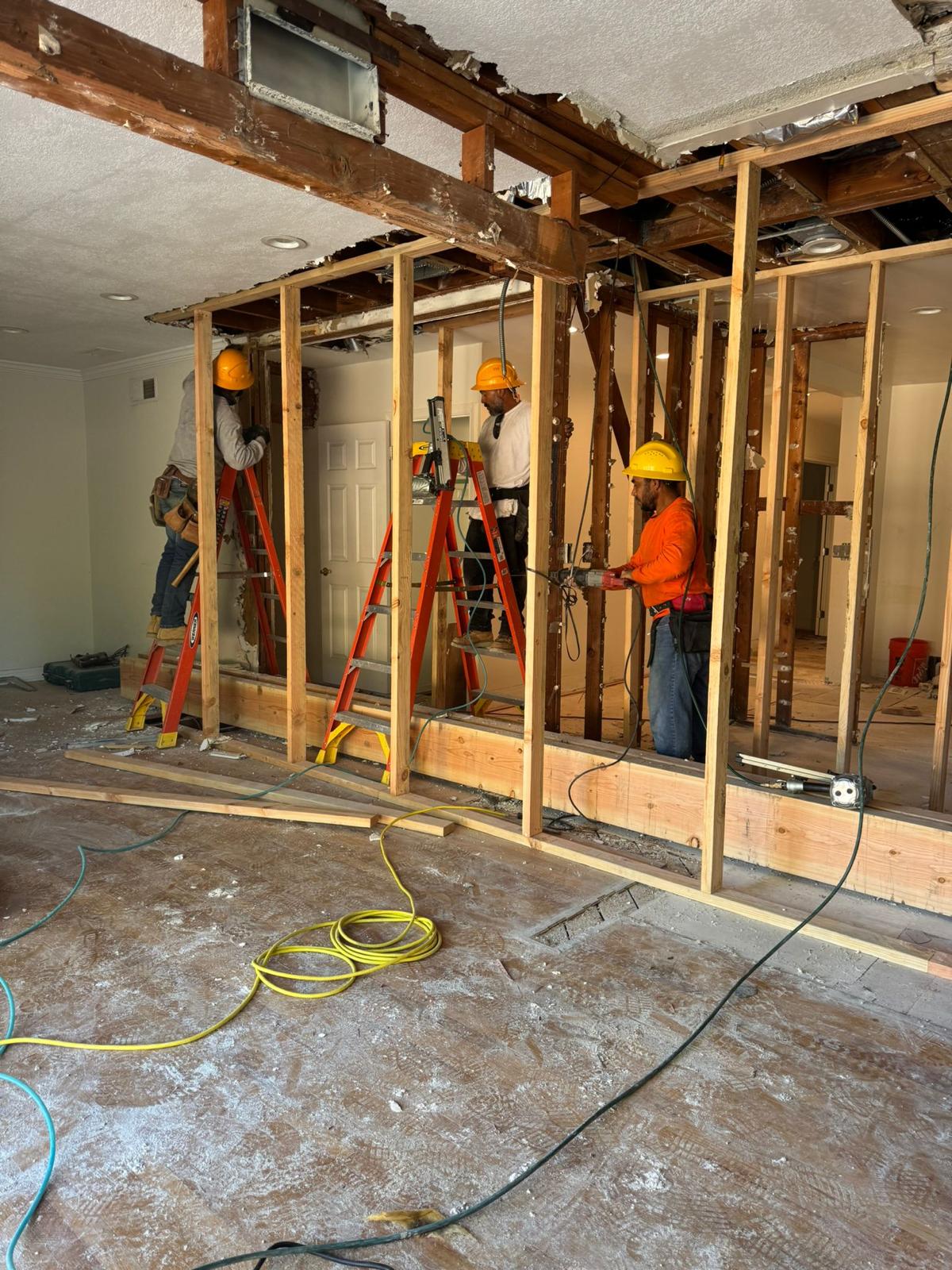 Woodland Hills kitchen during construction — Master Kitchen crew opening up walls to studs for open-concept layout