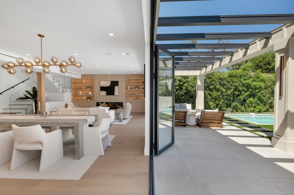 The kitchen with its doors open to the pool